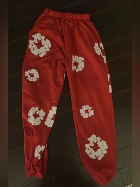 Red denim tears pants.